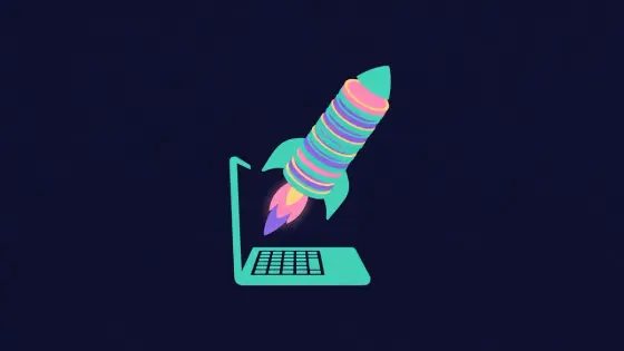 Small rocket made of coins lifting off from a laptop keyboard